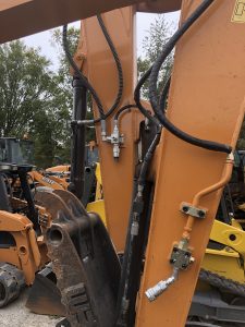 mount diverter valve directly to excavator arm